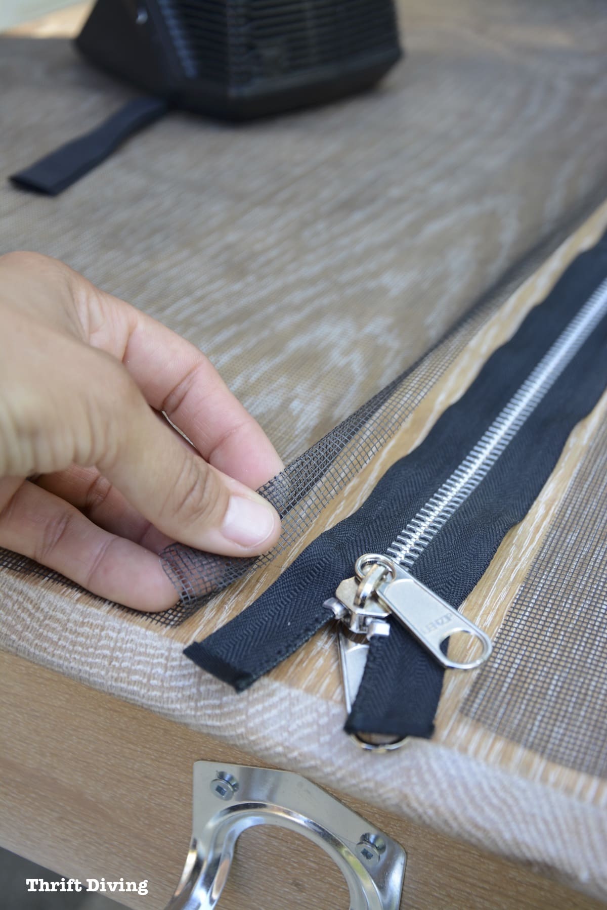 How to Make a Garage Door Screen with a heavy-duty zipper to keep out flying insects, such as mosquitos, stink bugs, bees, moths, flies, and gnats. - Thrift Diving
