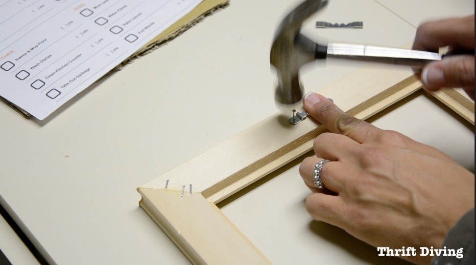 Frame Anything: How to Make DIY Picture Frames - Hammer on a couple of picture hangers on the back. Get the tutorial! - Thrift Diving