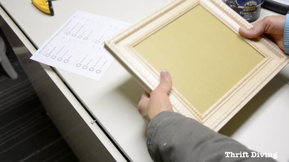 Frame Anything: How to Make DIY Picture Frames - Place a piece of cardboard in the back of the DIY picture frame. Get the tutorial! - Thrift Diving