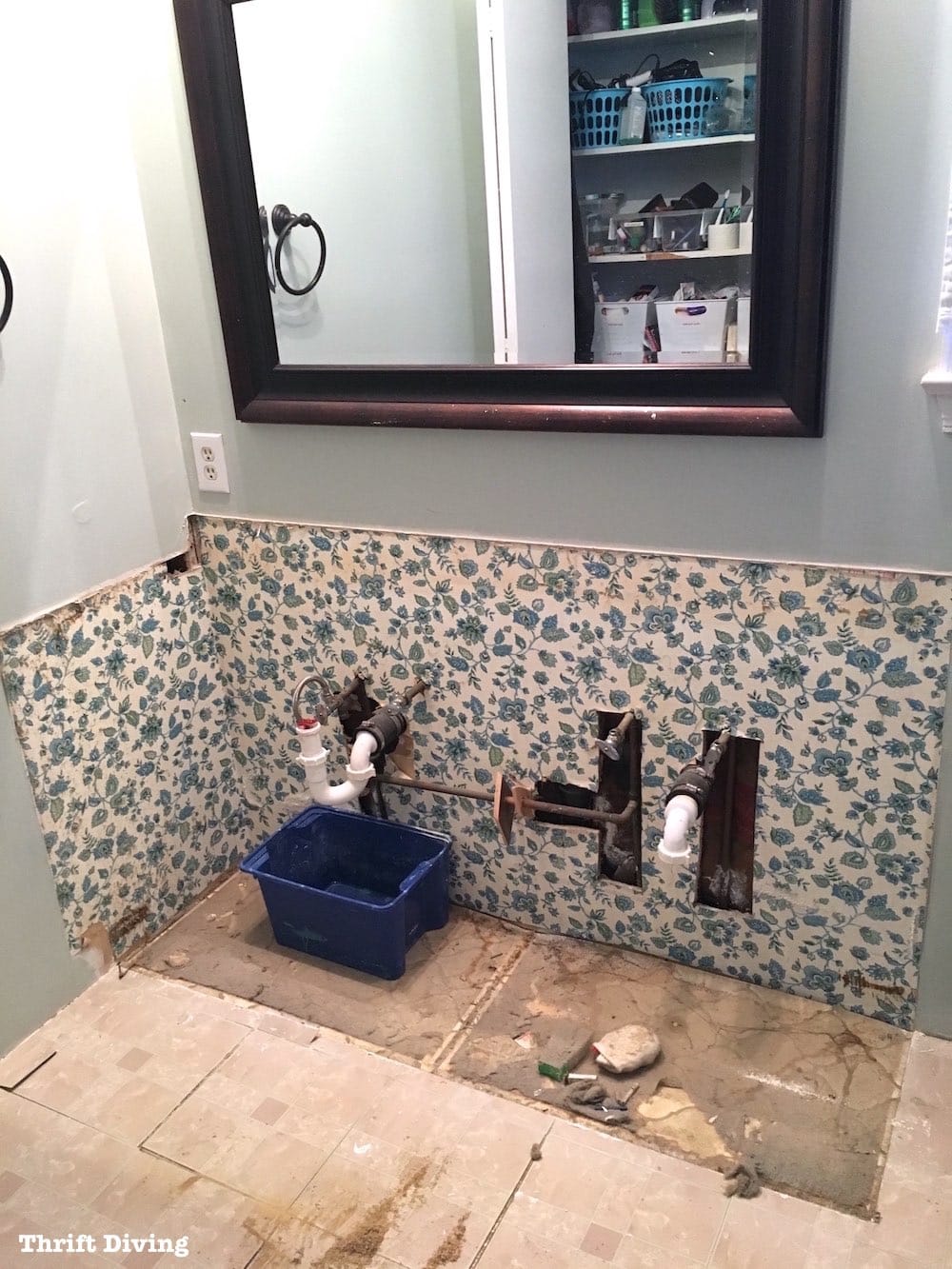 Learn how to remove your old bathroom vanity and build a custom DIY bathroom vanity from scratch! - Thrift Diving