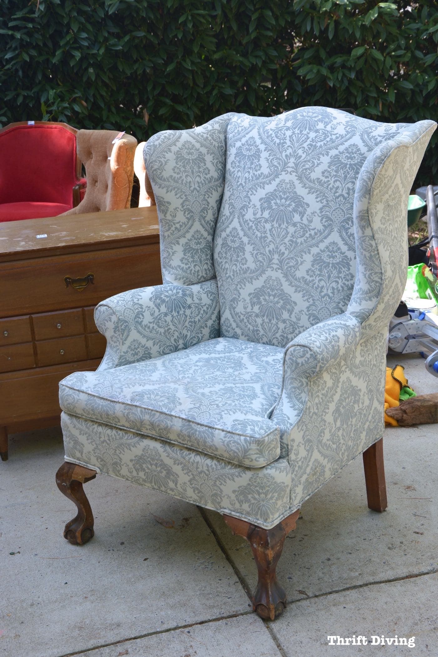 Learn how to reupholster a wingback chair and watch the video tutorials! - Thrift Diving