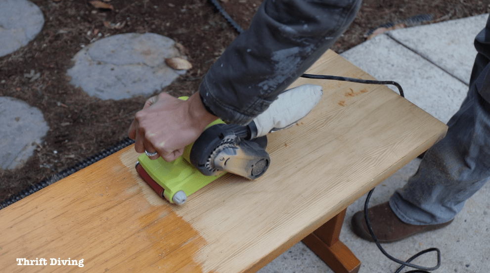 Dining Room Bench Makeover Using Beyond Paint - Use a belt sander to strip and level the surface of wood. - Thrift Diving 