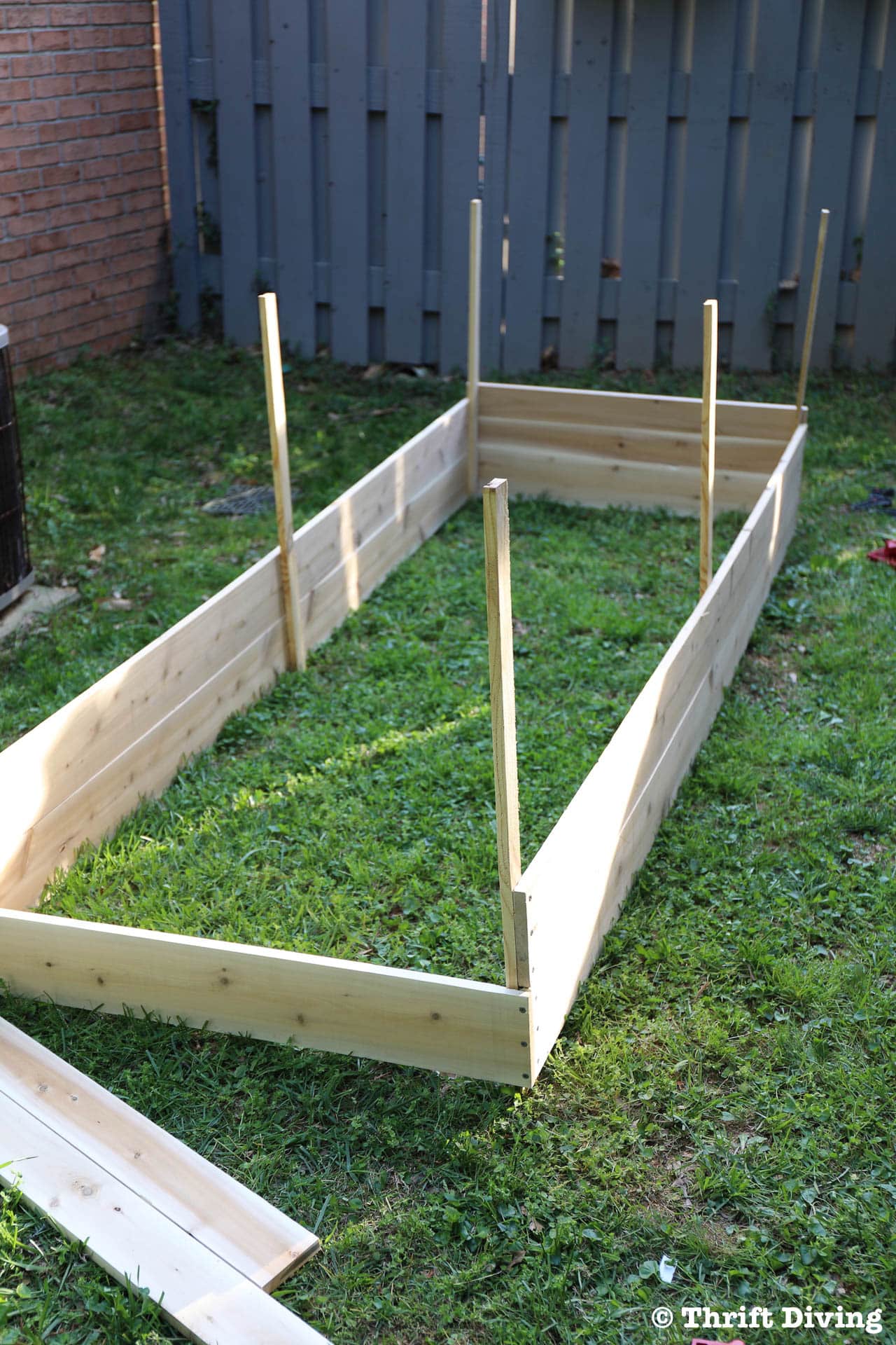 How To Build A Diy Raised Garden Bed And Protect It With A Metal Fence