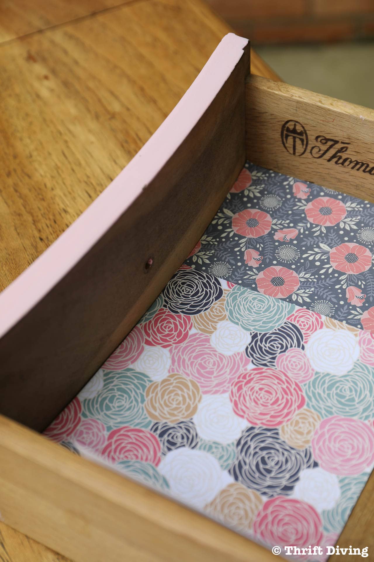 https://thriftdiving.com/wp-content/uploads/2018/05/How-to-Line-Drawers-with-Pretty-Scrapbook-Paper-Trim-paper-to-fit-curves-Thrift-Diving.jpg