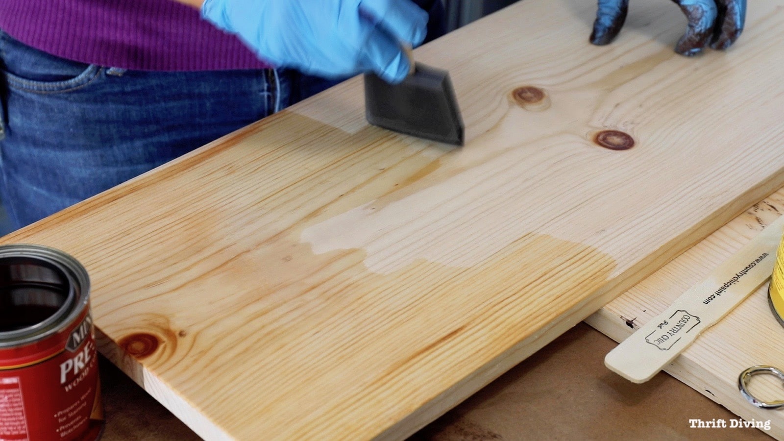 How to Build DIY Closet Shelves - Use Minwax pre-conditioner on pine boards before staining the shelves to get an even color and no blotchiness in the stain. Leave it sit for 15 minutes, wipe off, and then stain.