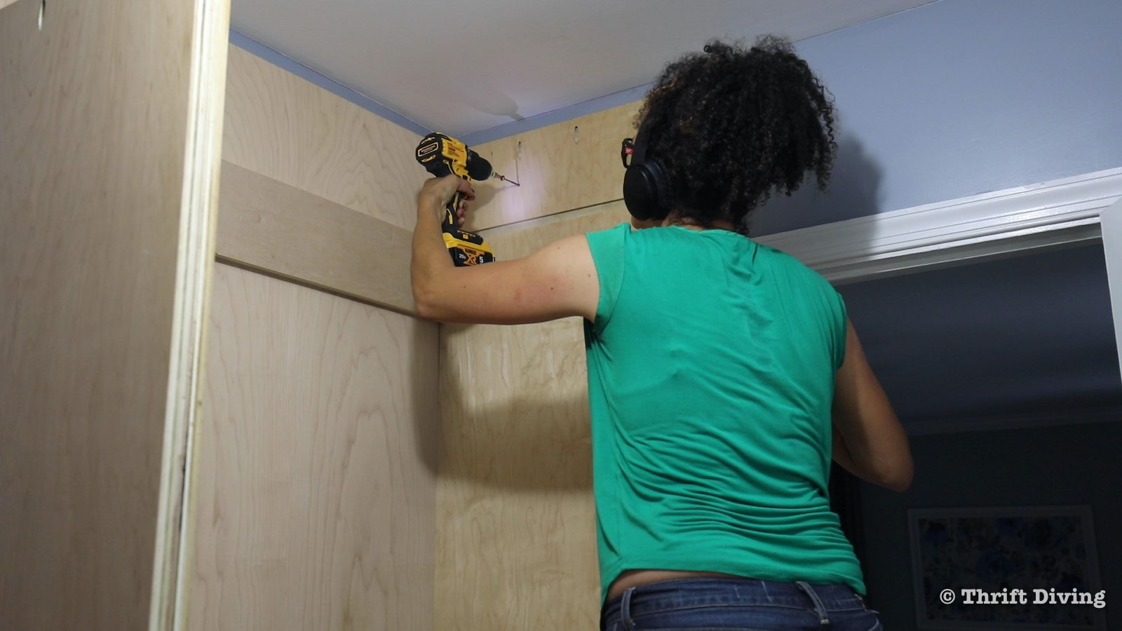How to Build a Walk-in Closet Organizer From Scratch - Use 2-1/2" cabinet screws to secure closet organizer to studs at the top, middle, and bottom. - Thrift Diving