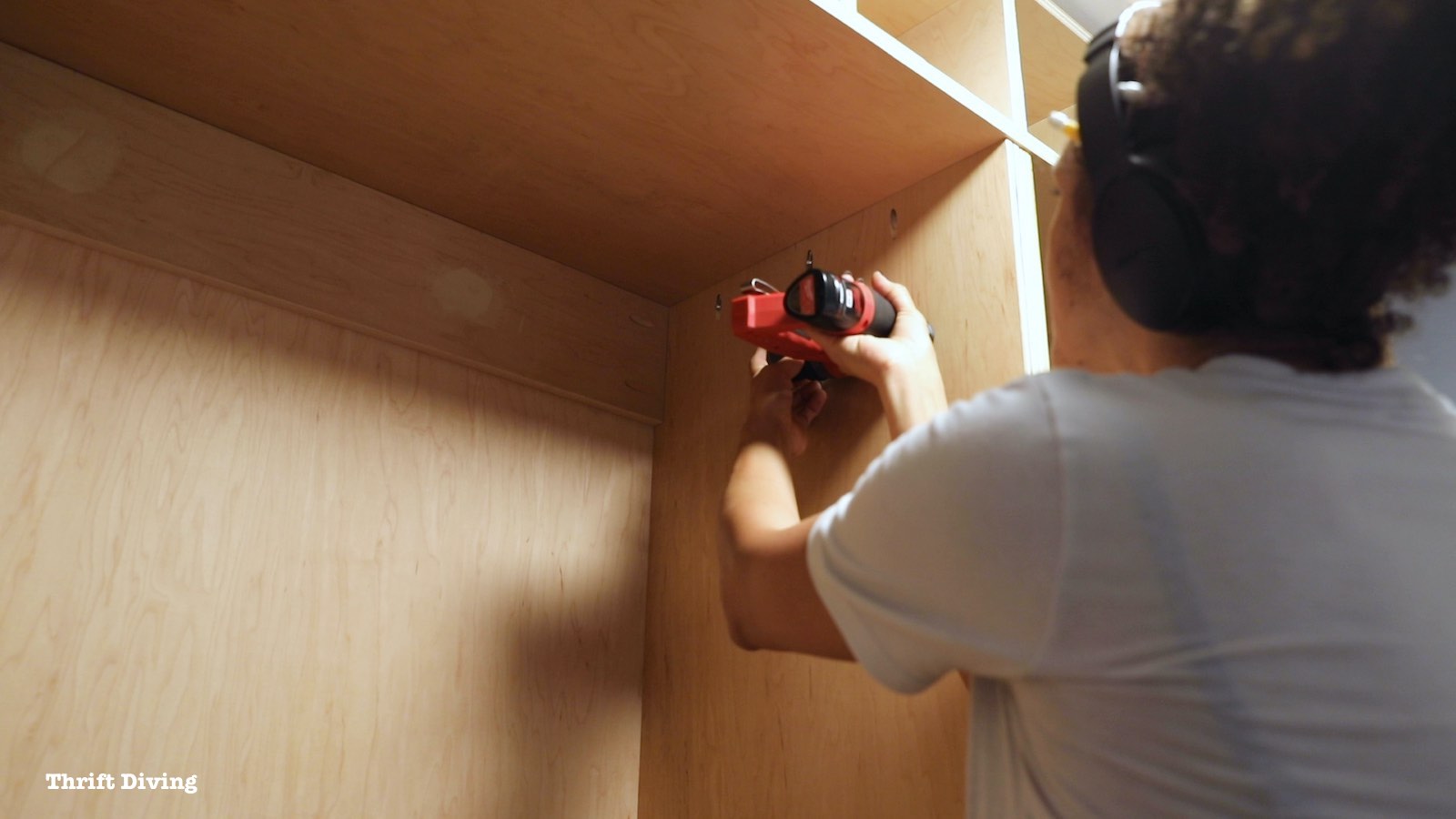 How to Build a Walk-in Closet Organizer From Scratch - Use pocket hole screws to secure partitions to top panels. - Thrift Diving