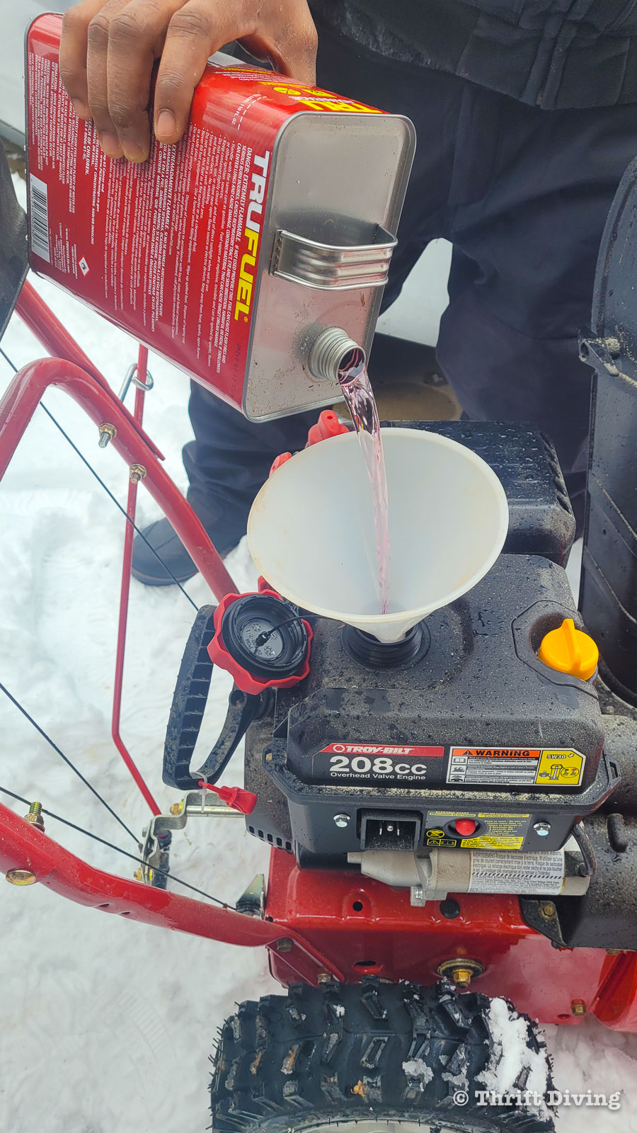 5 Questions You Must As Before Buying and Using a Snowblower - Use a funnel to prevent spills - Thrift Diving
