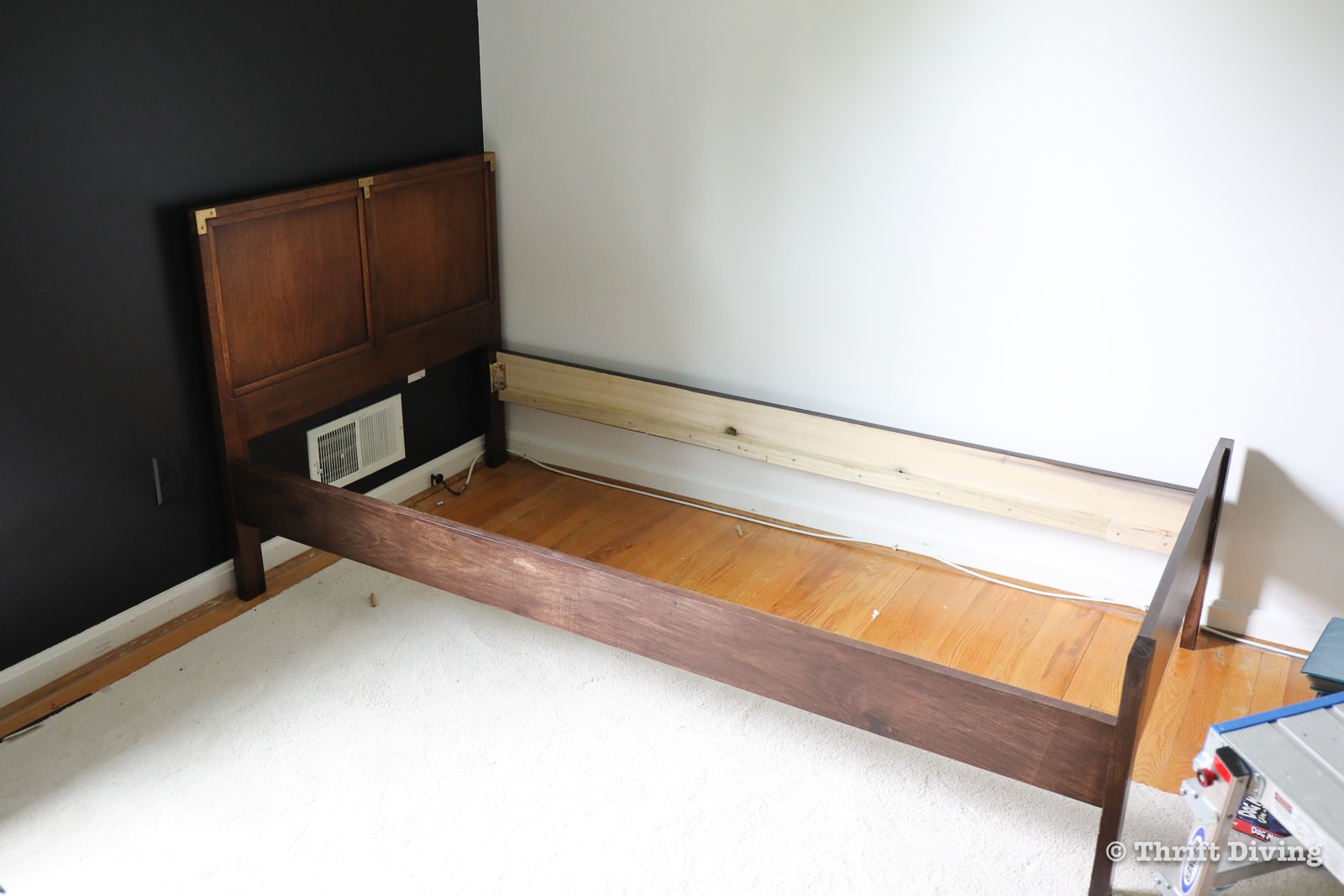 How to Build a Bed Using Vintage Headboards From the Thrift Store - Attach the bed rails to the headboard and footboard. - Thrift Diving