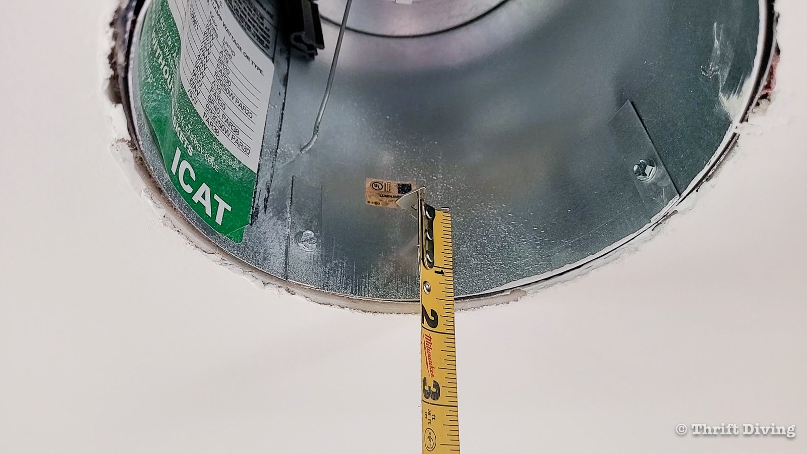 Measure 1-7/16 from bottom edge of recessed housing to locate area to install clips to retrofit your recessed lights to LED downlights - Thrift Diving
