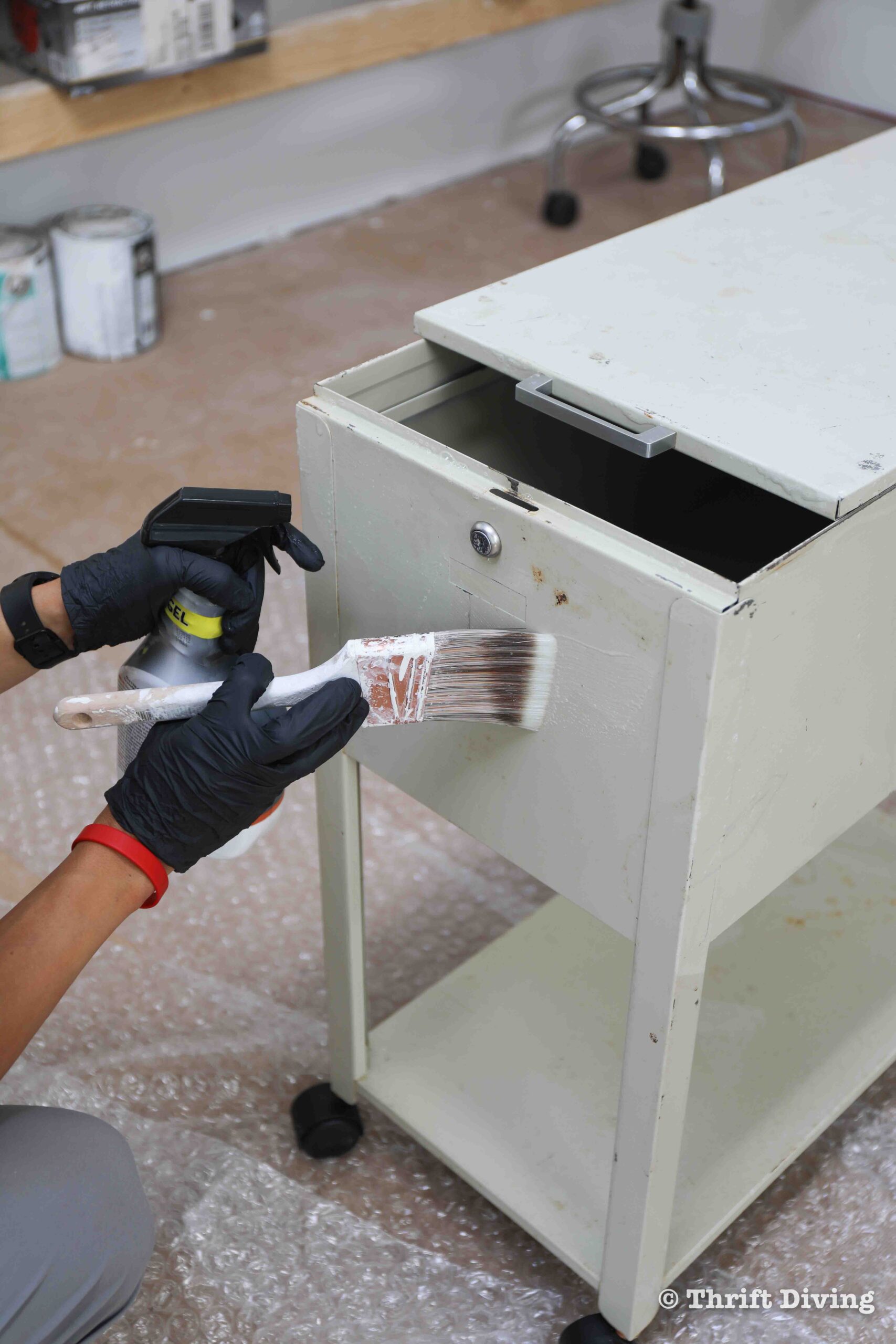 How to Paint a Metal File Cabinet - Use rust remover gel on the entire file cabinet and then remove with fresh water. - Thrift Diving