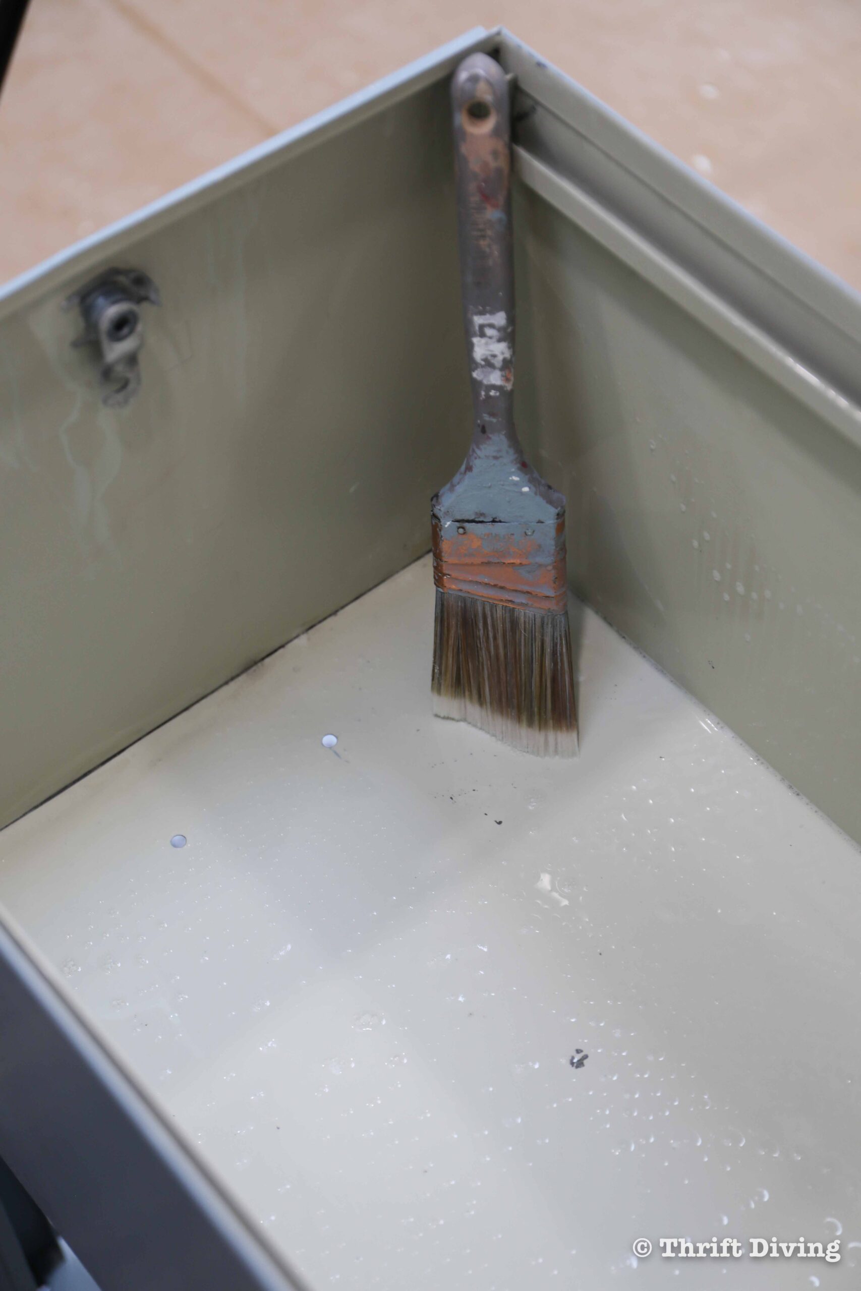 How to Paint a Metal File Cabinet - Use deglosser on metal before painting for good adhesion. - Thrift Diving