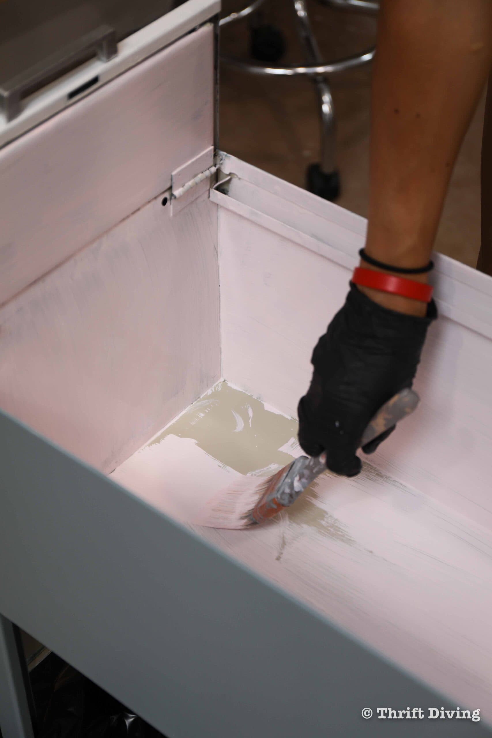 How to Paint a Metal File Cabinet - Paint the inside of the file cabinet with furniture paint. - Thrift Diving