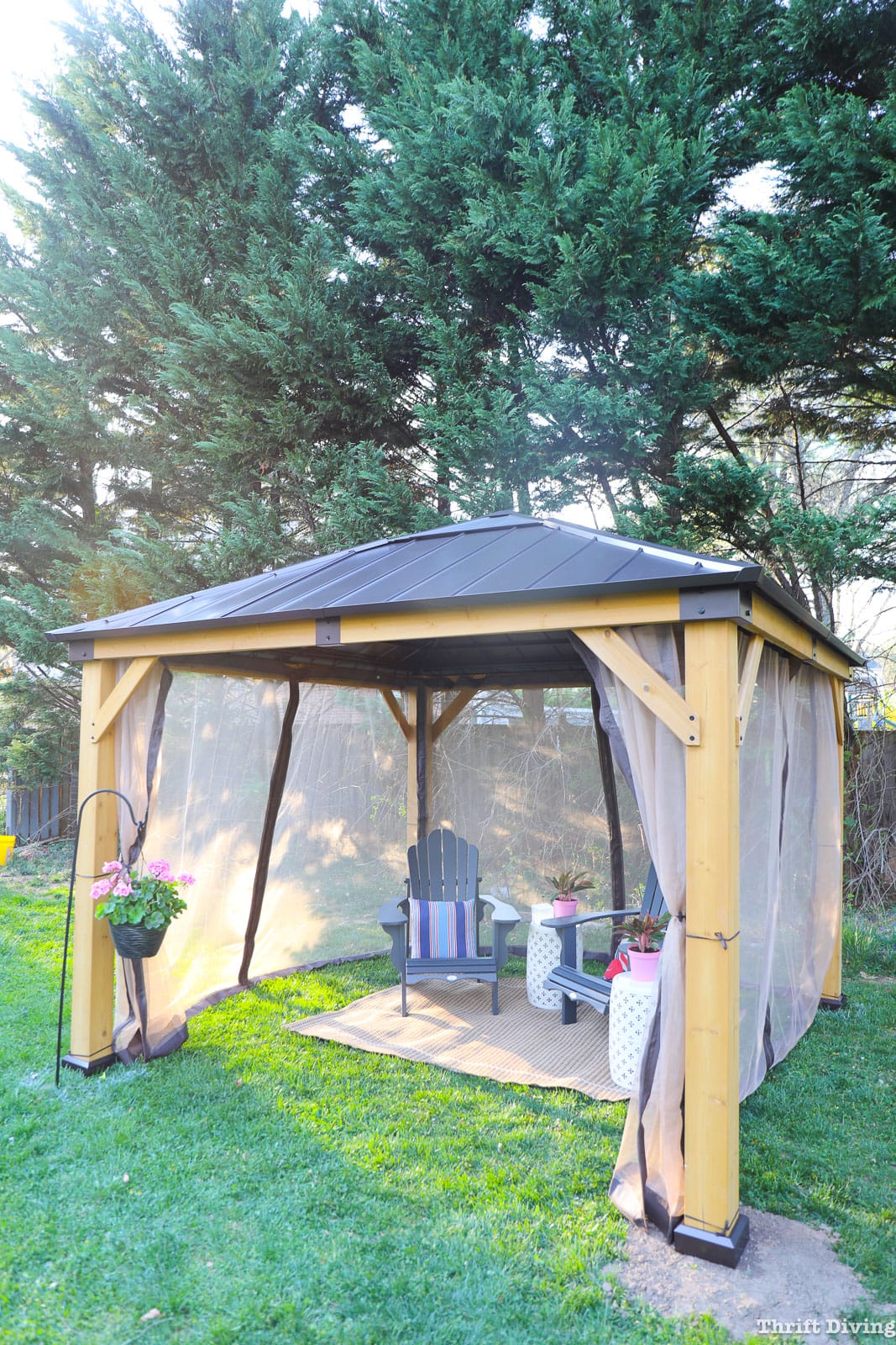 How to Make DIY Gazebo Screens - Backyard gazebo with mosquito netting.