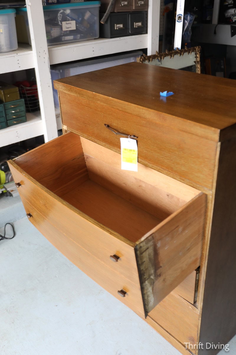 musty dresser with the drawer open