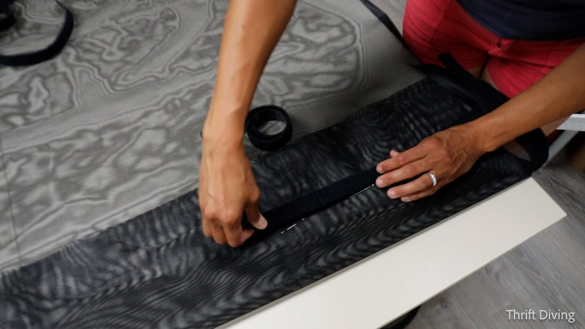 How to Make DIY Gazebo Screens - Applying Velcro Outdoor Extreme to the edge of the gazebo screen.