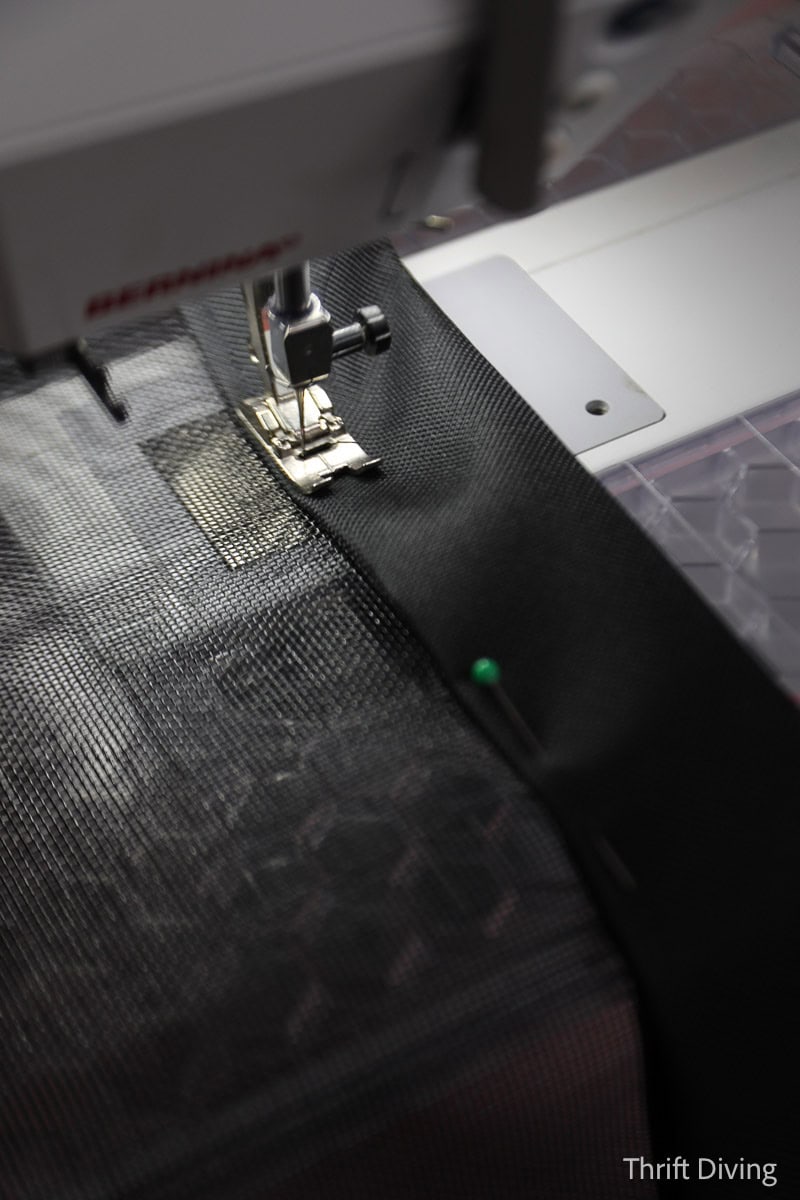 How to Make DIY Gazebo Screens - Sewing black binding into a gazebo screen.