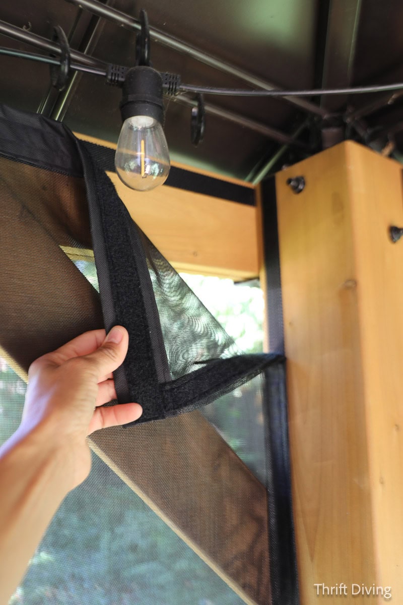 How to Make DIY Gazebo Screens - Gazebo screen held in place with Velcro attached to gazebo posts.