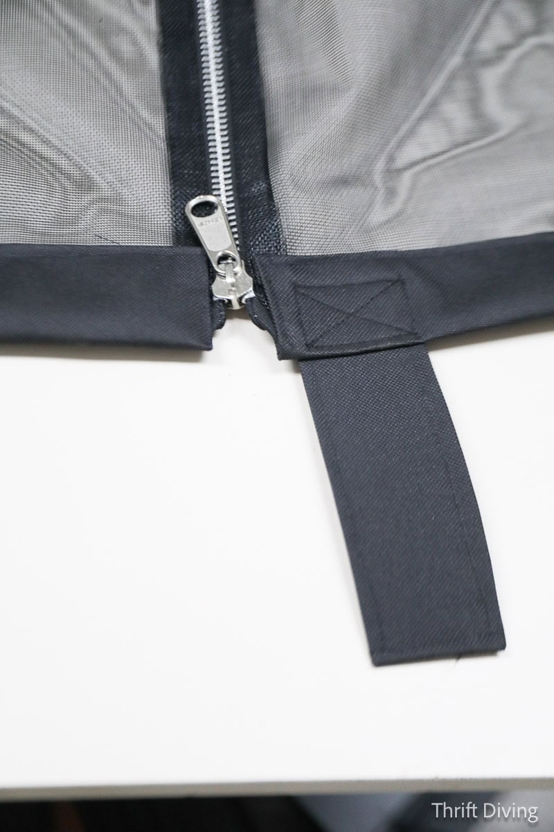 How to Make DIY Gazebo Screens - Gazebo screens with a zipper, black binding, and a foot tab sewn at the bottom for easy access into the gazebo.