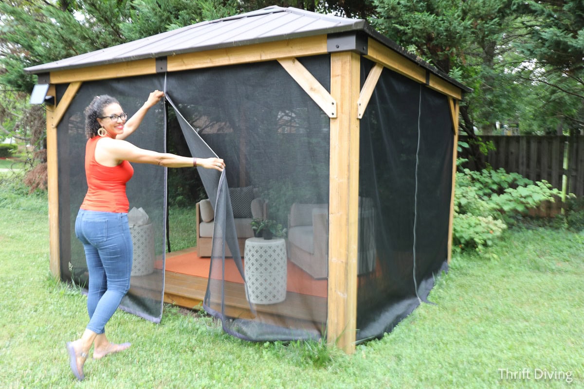 How to Make DIY Gazebo Screens - Backyard gazebo with gazebo screen panels with a zipper opening.
