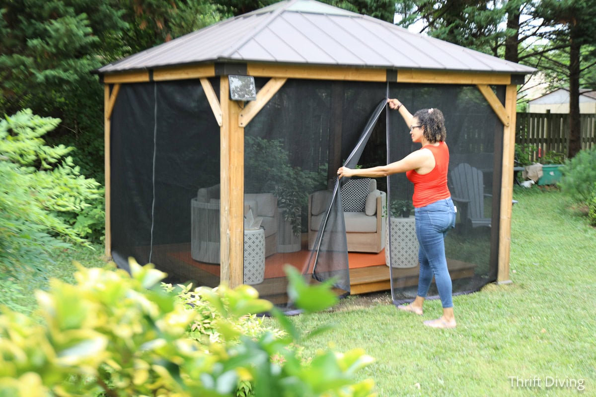 How to Make DIY Gazebo Screens - Gazebo with screens and zipper openings in backyard.