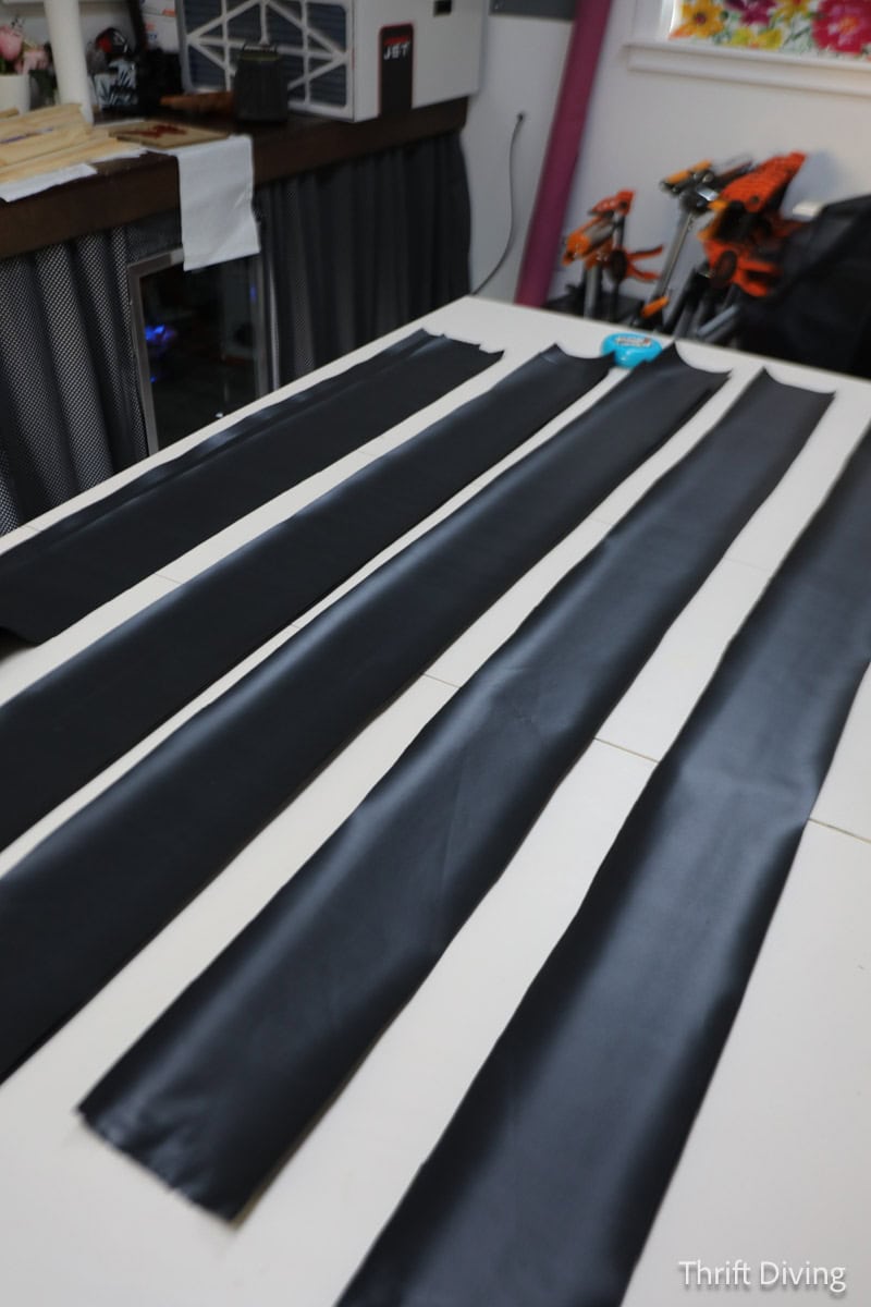 How to Make DIY Gazebo Screens - Strips of waterproof fabric to use as binding on gazebo screens, lying on the table.